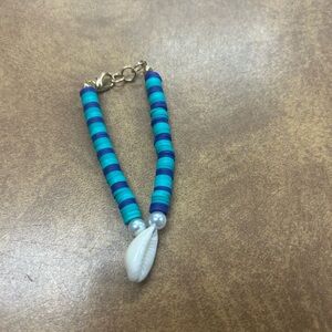 Blue and White Beaded Bracelet with Shell Charm